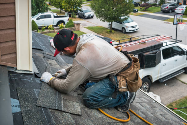 Professional Roof Replacement technician working in Mackinaw, IL
